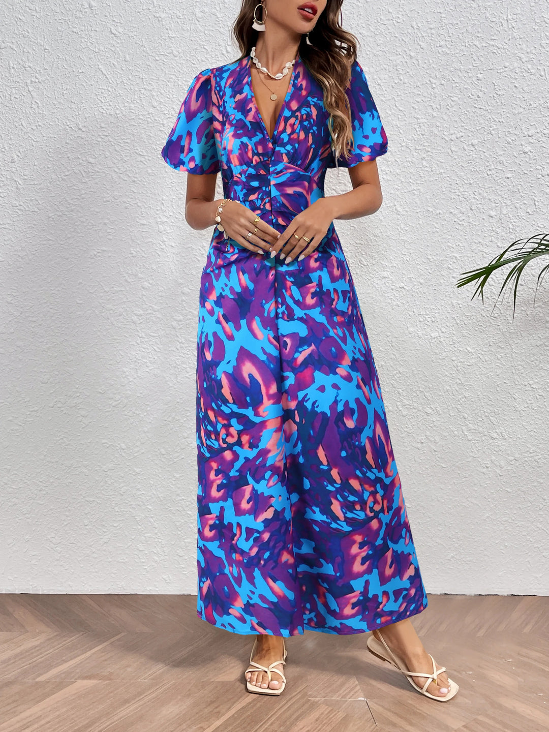 Robe colorée à plis